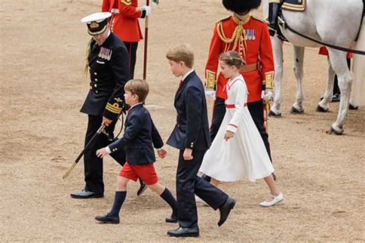 Prince George walking on the grass